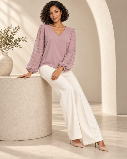 Blouse Élégance Aérienne – Col V et Manches Bouffantes en Voile Texturé