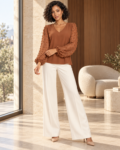 Blouse Élégance Aérienne – Col V et Manches Bouffantes en Voile Texturé